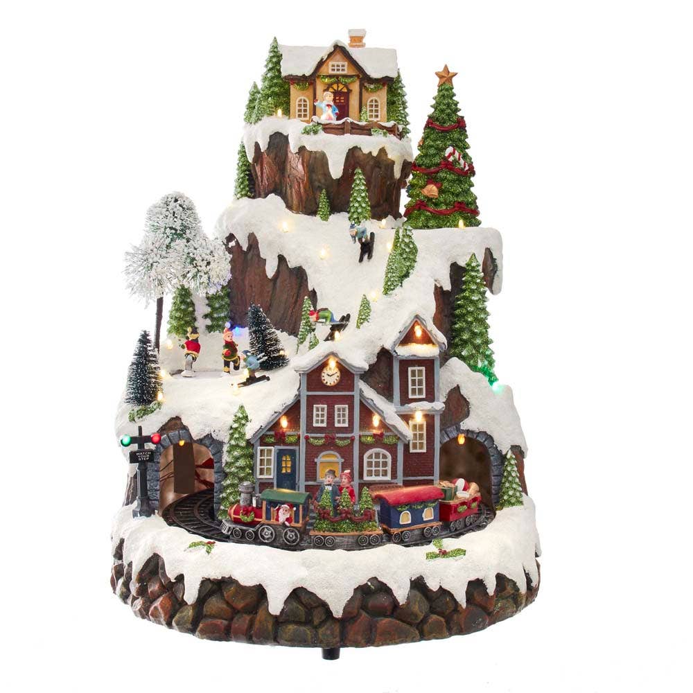 Kurt S. Adler, Inc. - 17"MUSICAL LED VILLAGE ON MTN TABLETOP
